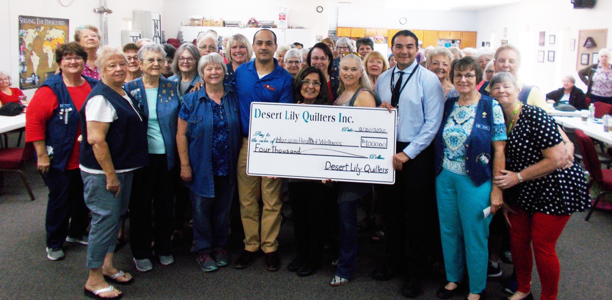 Desert Lily Quilters donates to nonprofit